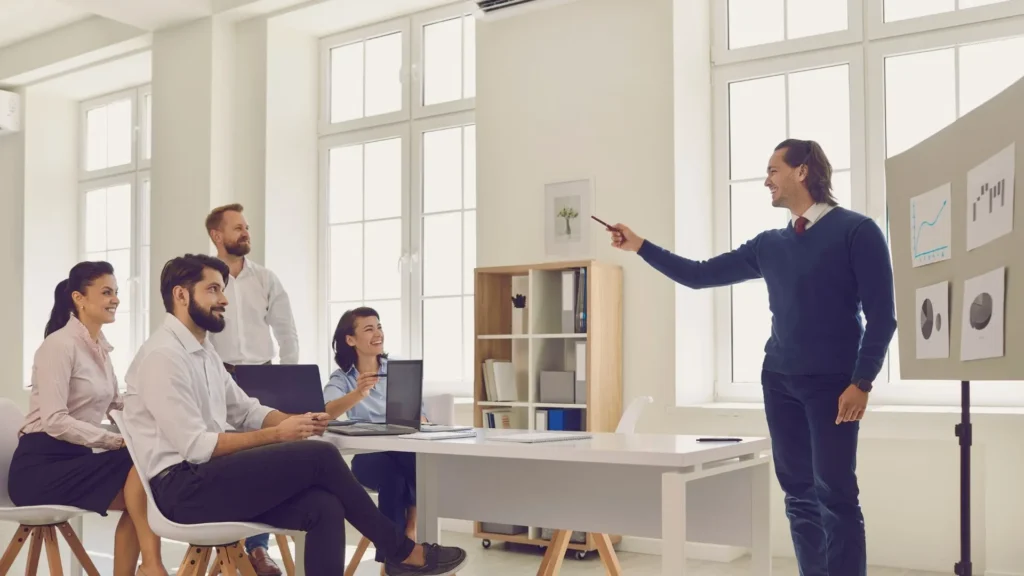 Persona distributing the Leadership lesson in corporate meeting